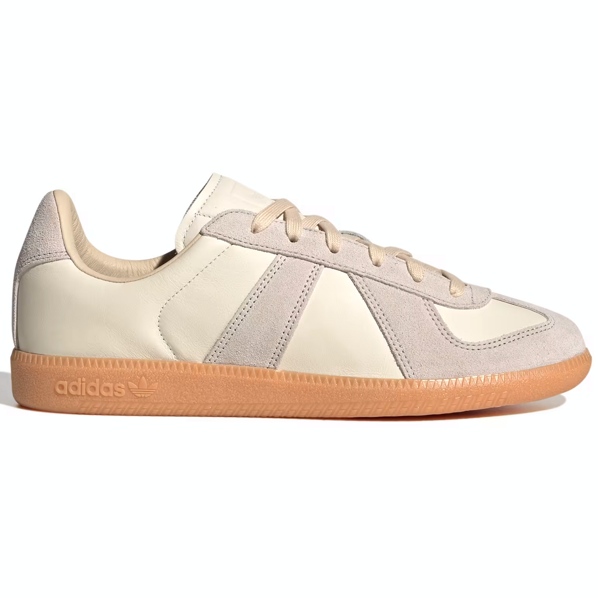 Beige Adidas sneaker with brown sole on a white background