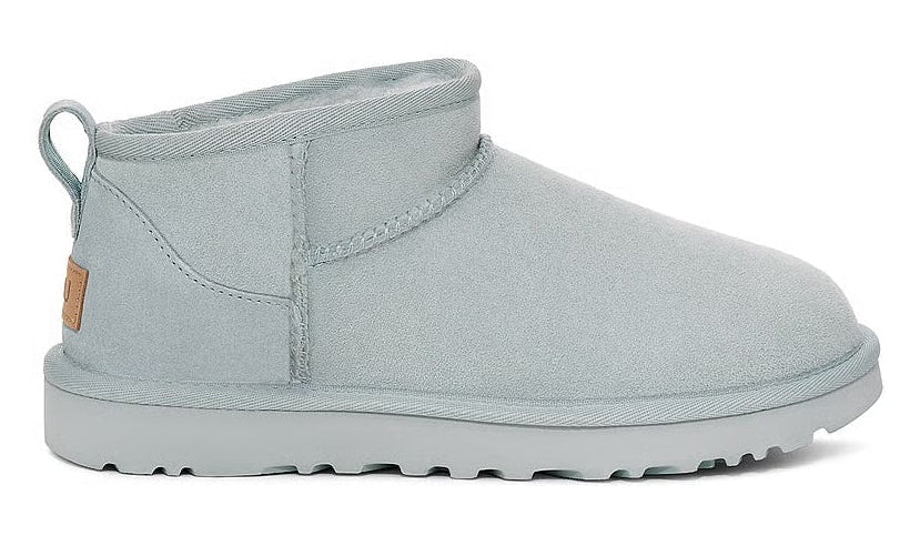 Light gray ankle boot on a white background
