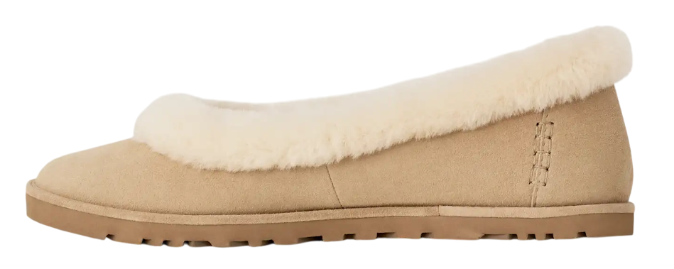 Beige slip-on shoe with white fur lining on a white background