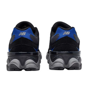 Black and blue athletic shoes with New Balance logo on a white background