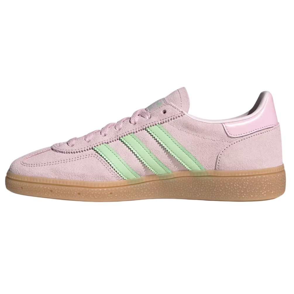 Pink sneaker with green stripes on a white background