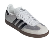 Gray and black Adidas sneaker on a white background
