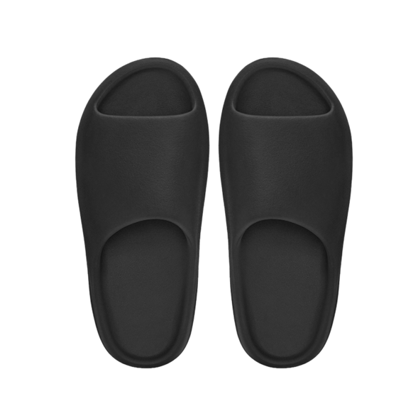 Pair of black slippers on a white background