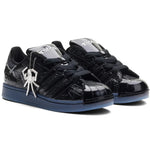 Black sneakers with a spider logo on a white background - Image 2