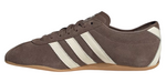 Brown sneaker with white stripes on a white background - Image 3