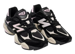 Black and white sneakers with New Balance logo on a white background - Image 2