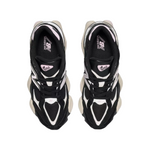 Black and white sneakers with brand logo on a white background - Image 4