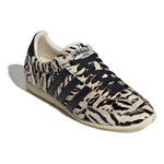 Sneaker with zebra pattern on a white background - Image 4