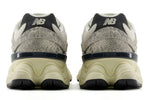 Pair of New Balance sneakers shown from the back on a white background - Image 5