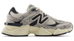 Gray and beige sneaker with black accents on a white background - Image 1
